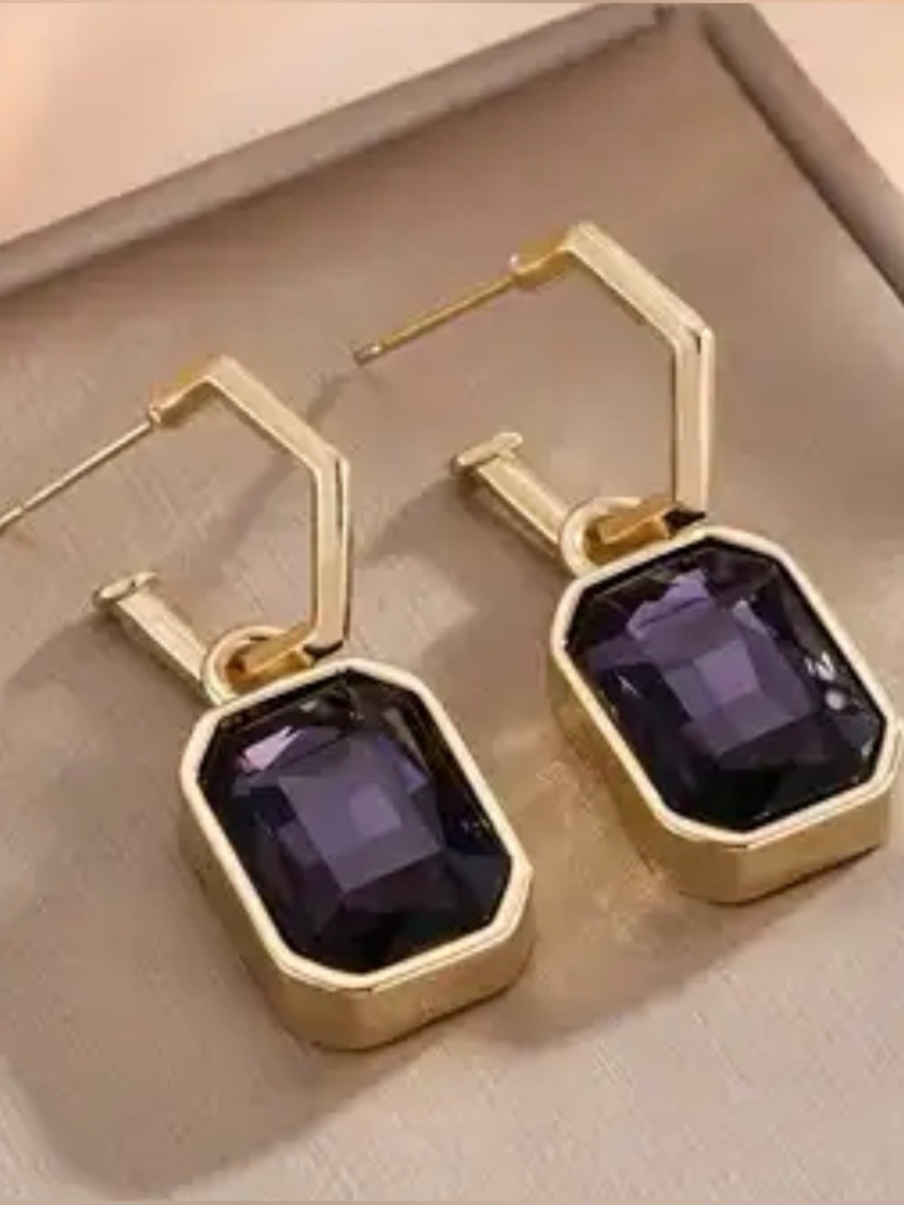 Gold-Tone Earrings with Purple Faceted Stone